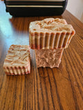 Handmade 4 oz peach, gardenia, and lilac soap bar with natural variations